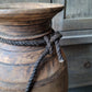 Oud houten nepalese kruik met touw nr. 26