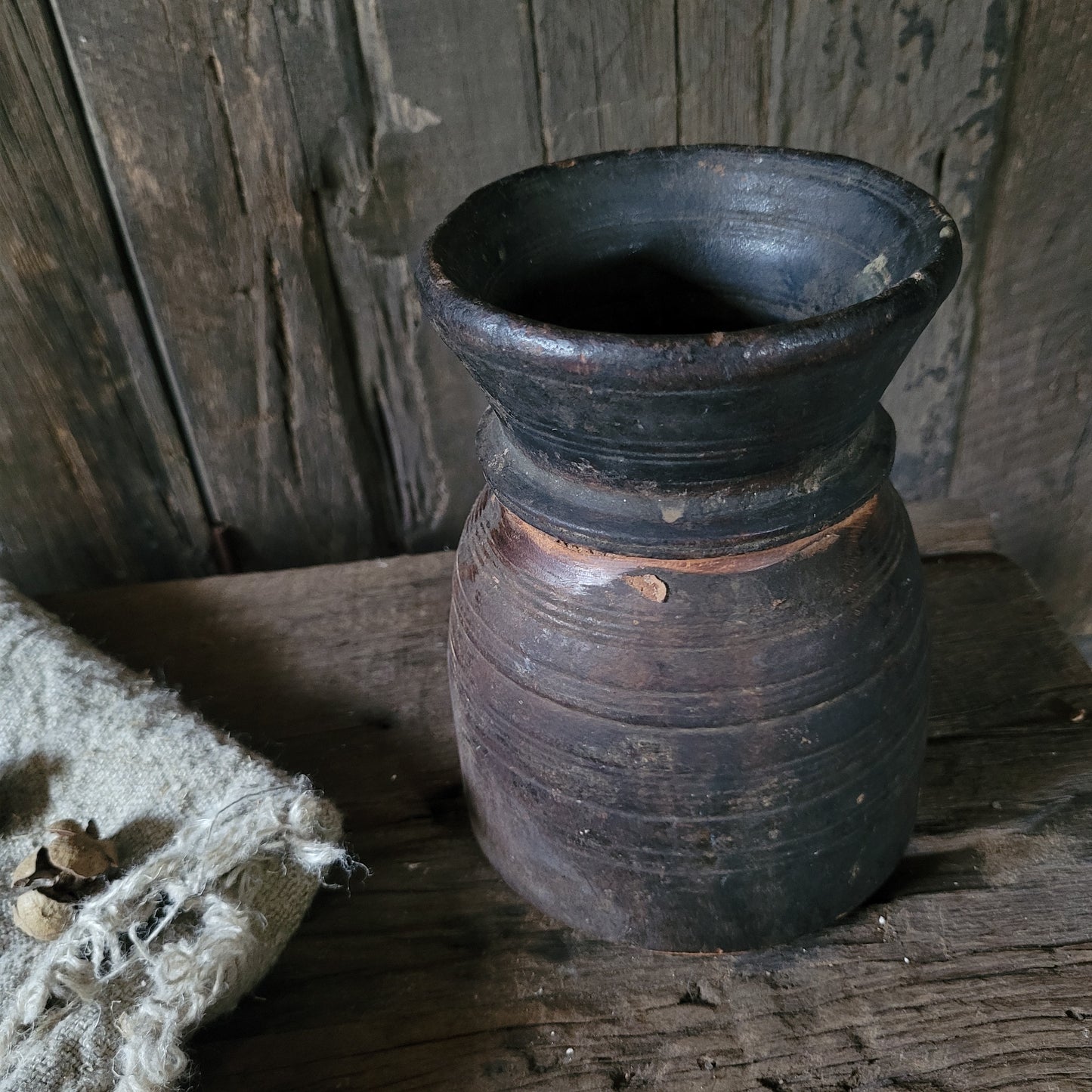 Oud houten nepalese kruik