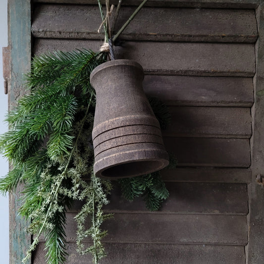 Houten kerstklok aan touw