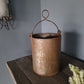 Roestige pot met hengsel